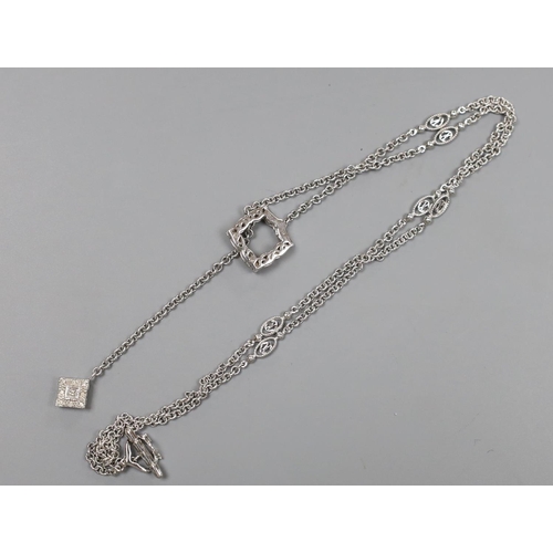 1948 - A modern 750 white metal and diamond cluster set drop necklace, 54cm, gross weight 10 grams.... 