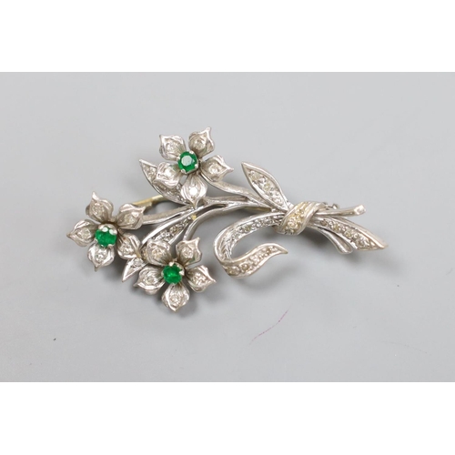 1958 - A 20th century white metal, emerald and diamond set spray brooch, 45mm, gross 10 grams.