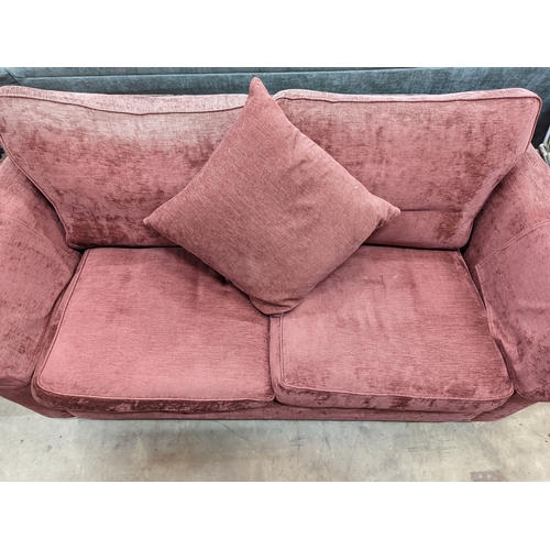 1097 - A contemporary plum fabric two seater settee, length 176cm, depth 84cm, height 86cm