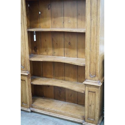 11 - An 18th century style French provincial pine open bookcase, length 116cm, depth 28cm, height 204cm... 