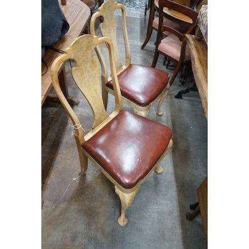 24 - A set of four Queen Anne style pale walnut dining chairs with Merryweather plaques