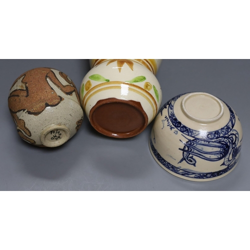 267 - Three pieces of Yolande Beer pottery, to include a vase, griffin bowl and a stoneware figural vase... 