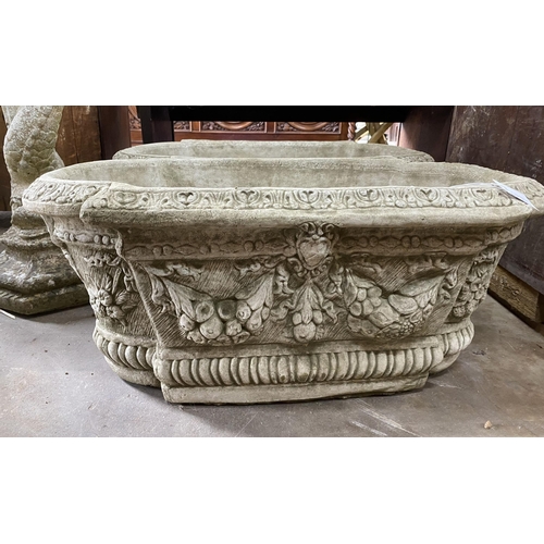 3 - A pair of shaped oval reconstituted stone garden planters with floral swag bodies, width 82cm, depth... 