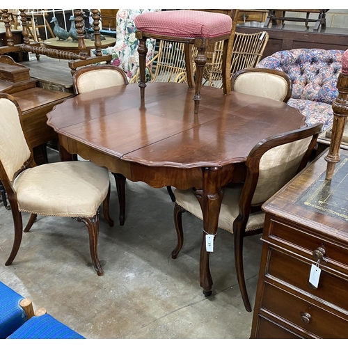 33 - A 19th century French mahogany extending dining table on cabriole legs, width 134cm extended, one sp... 