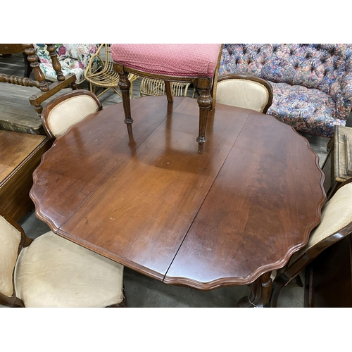 33 - A 19th century French mahogany extending dining table on cabriole legs, width 134cm extended, one sp... 