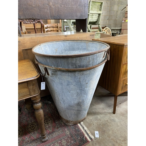 43 - A pair of large vintage galvanised iron handled hoppers, diameter 69cm, height 75cm