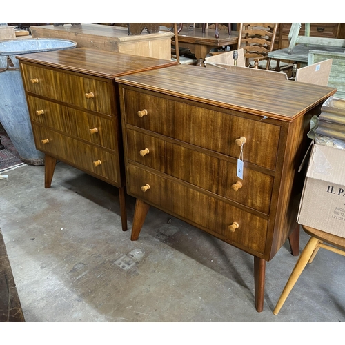 45 - A pair of 1960s Morris Of Glasgow walnut three drawer chests, width 79cm, depth 47cm, height 86cm... 