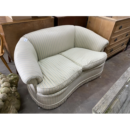 49 - A kidney shaped Edwardian settee, length 150cm, width 82cm, height 70cm