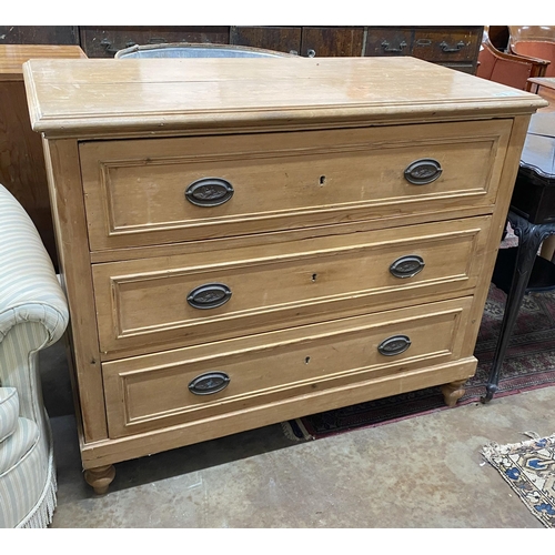 51 - A 19th century east European pine three drawer chest, width 110cm, depth 56cm, height 93cm... 