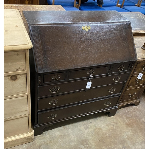 59 - A late 18th century oak bureau, width 89cm, depth 50cm, height 102cm