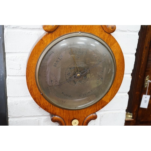 19 - A Victorian oak wheel barometer, height 104cm