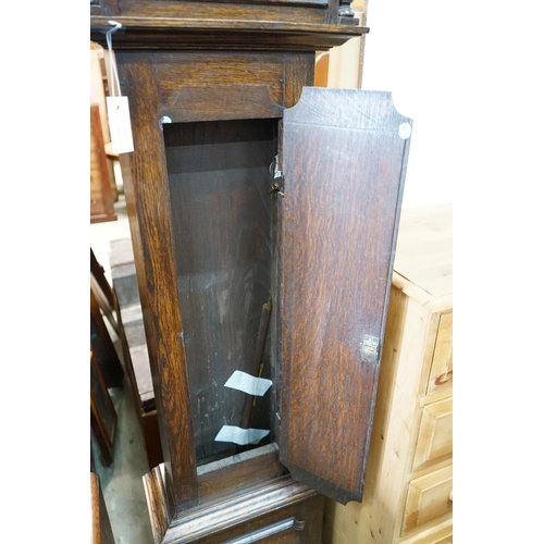 22 - A 1920's oak 8 day longcase clock, height 187cm