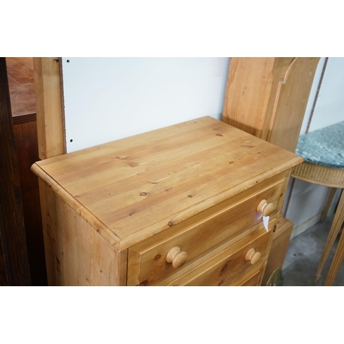 23 - A small modern pine five door chest, width 69cm, depth 40cm, height 106cm