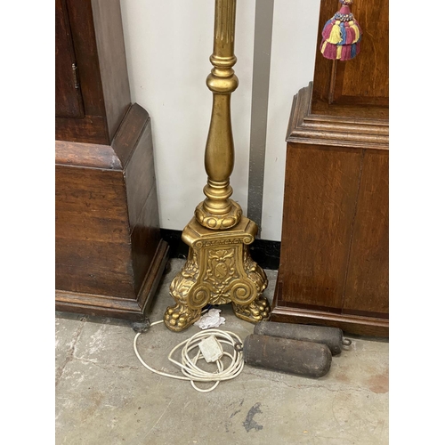 28 - A gilt lamp standard, height 150cm