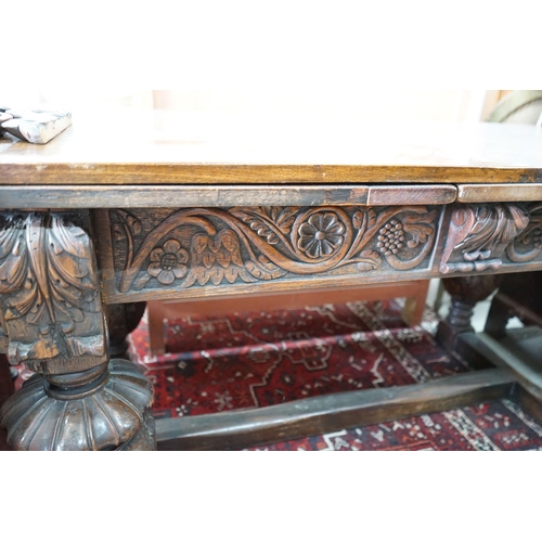 62 - A 17th century style rectangular oak draw leaf dining table on carved baluster legs, 275cm extended,... 