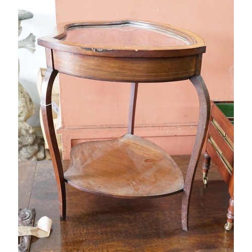 63 - An Edwardian mahogany shield shaped bijouterie table, width 50cm, depth 59cm, height 72cm... 