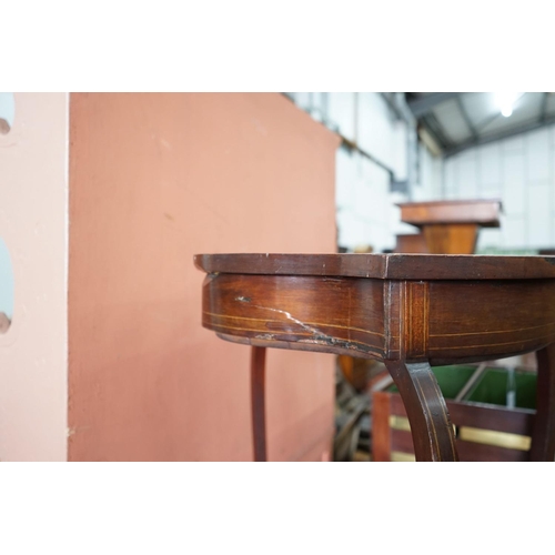 63 - An Edwardian mahogany shield shaped bijouterie table, width 50cm, depth 59cm, height 72cm... 