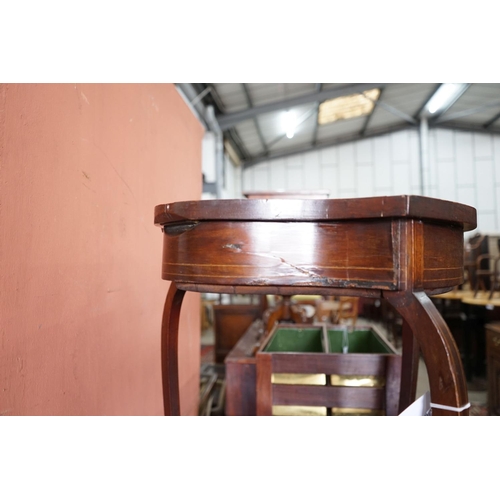 63 - An Edwardian mahogany shield shaped bijouterie table, width 50cm, depth 59cm, height 72cm... 