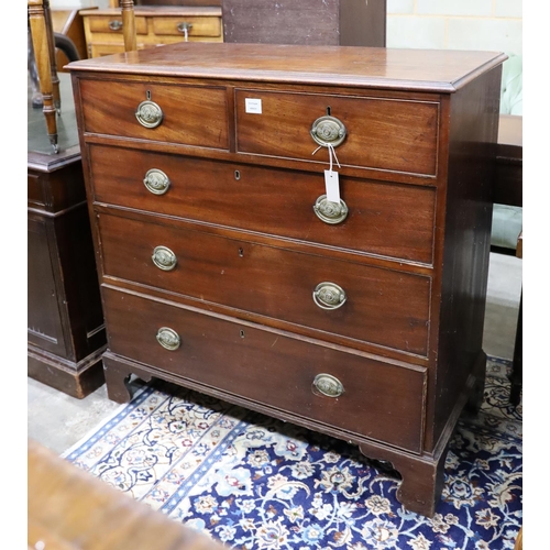 66 - A George III mahogany straight front chest, fitted three long drawers and two short drawers, width 1... 