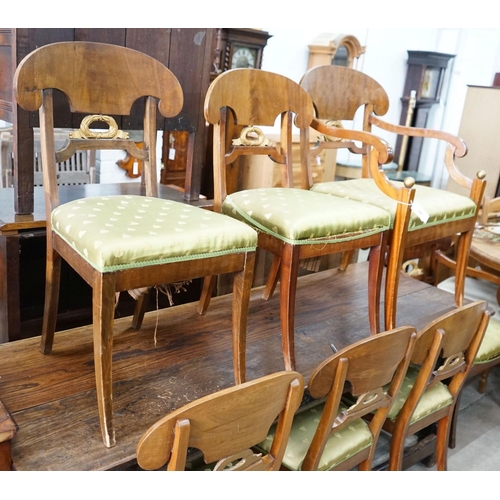 68 - A set of eight Swedish Biedermeier birch with mahogany veneer, wreath design dining room chairs, inc... 