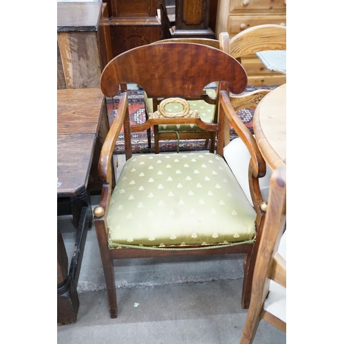 68 - A set of eight Swedish Biedermeier birch with mahogany veneer, wreath design dining room chairs, inc... 