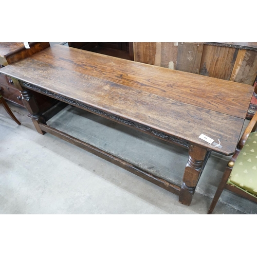 69 - A rectangular planked refectory type dining table, length 190cm, depth 66cm, height 71cm... 