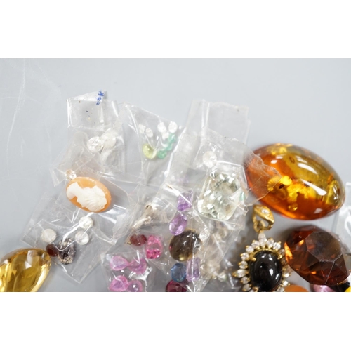 933 - A quantity of assorted unmounted cut gemstones including small diamonds and other minor jewellery.... 