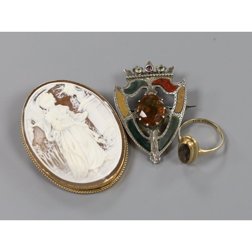 937 - A modern 9ct gold mounted oval cameo shell brooch, 53mm, a 9ct gold and gem set ring and a white met... 