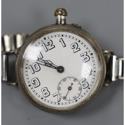 938 - A gentleman's early 20th century silver Borgel cased manual wind wrist watch, on a metal bracelet.... 