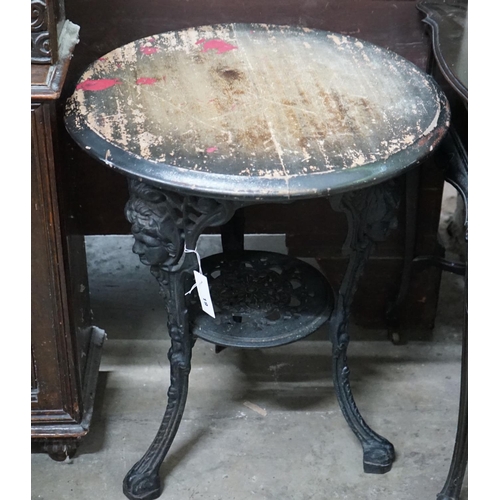 1019 - A cast iron Britannia circular table, diameter 58cm height 70cm