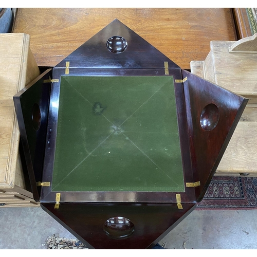 1020 - An Edwardian ebonised envelope card table, width 58cm height 74cm