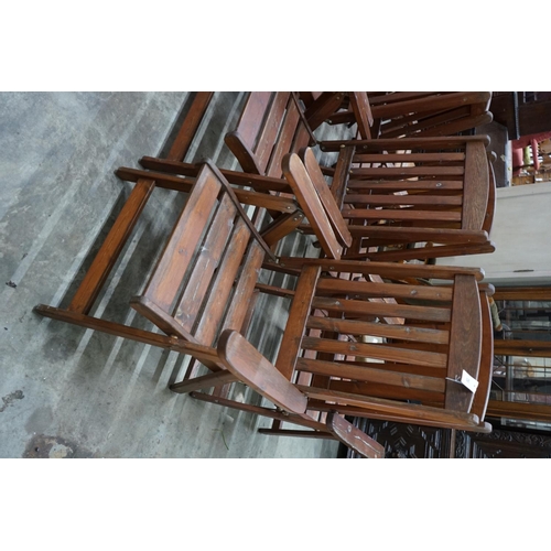 1025 - A set of eight Swedish 'Harbo' folding garden chairs