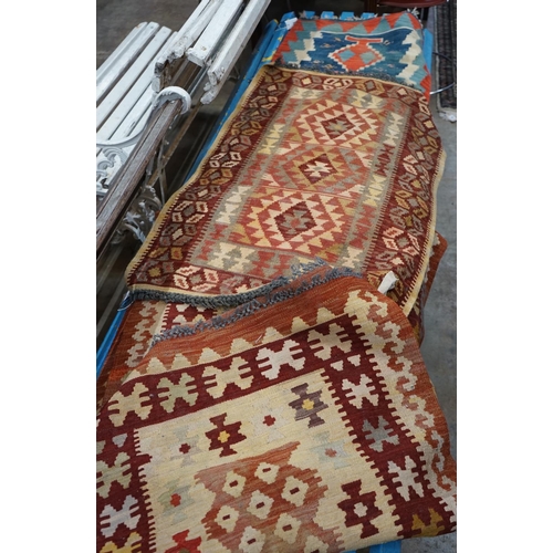 1031 - A Kelim flatware runner, 280 x 80cm and two smaller Kelim flatweave rugs