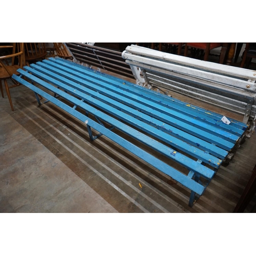 1032 - A painted slatted wrought iron park or station platform bench, length 240cm depth 70cm height 50cm... 