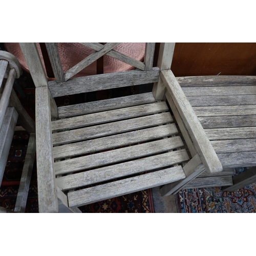 1038 - A weathered teak 'duet' garden seat, length 170cm width 52cm height 92cm