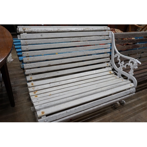 1045 - A painted slatted wood and wrought iron garden bench, length 106cm depth 74cm height 84cm... 