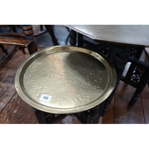 1050 - Two Indian brass tray top folding tables, largest width 56cm height 49cm