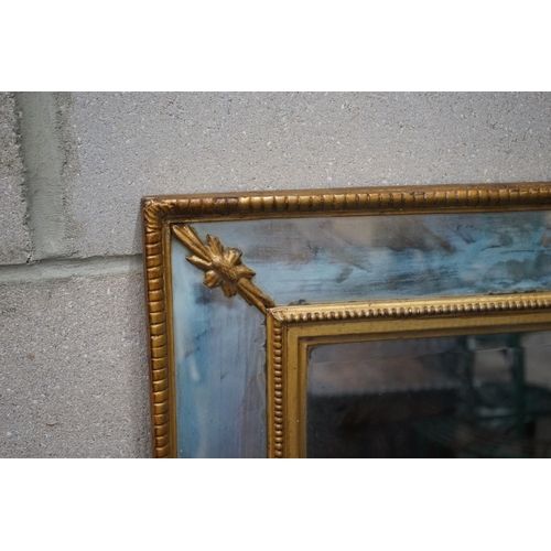 1052 - A 19th century gilt marginal plate rectangular wall mirror, width 89cm height 64cm