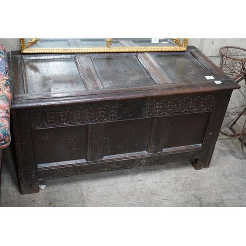 1053 - An 18th century oak coffer (re-lined), width 108cm depth 49cm height 56cm