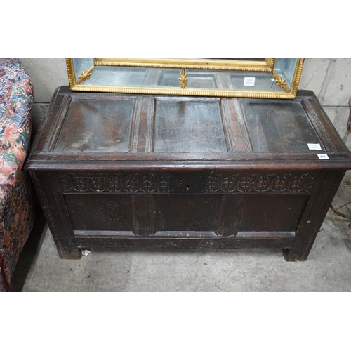 1053 - An 18th century oak coffer (re-lined), width 108cm depth 49cm height 56cm