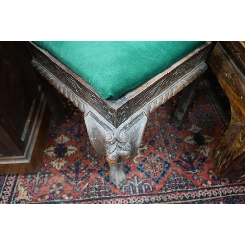 1070 - A Victorian carved oak corner elbow chair