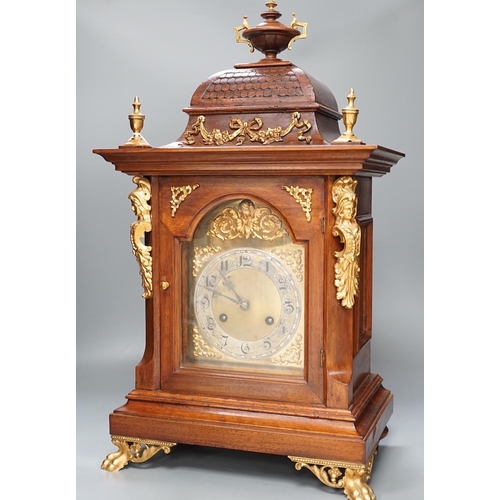 1415 - A reproduction gilt metal mounted bracket clock, 55cm