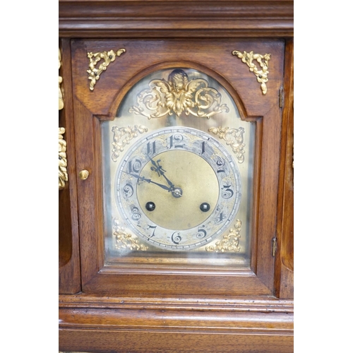 1415 - A reproduction gilt metal mounted bracket clock, 55cm