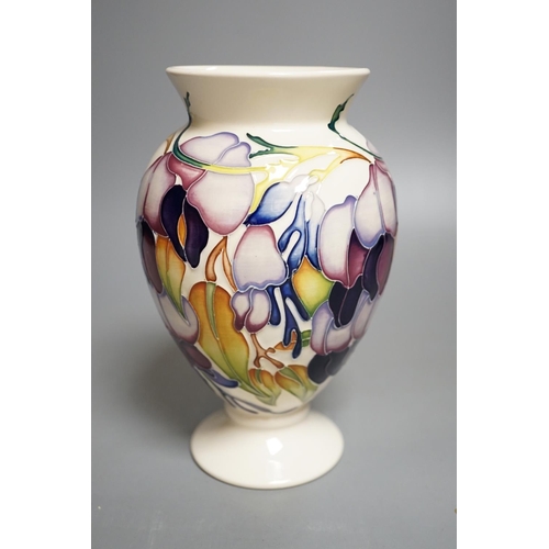 1429 - A Moorcroft 'purple wisteria' vase, 2013,17.5 cms high.