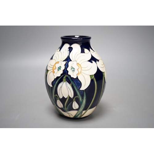 1434 - A Moorcroft 'daffodil glade' vase by Rachel Bishop, limited edition 12/25, 2016, boxed,13 cms high.... 