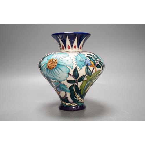 1438 - A Moorcroft 'Persian bouquet' trial vase by Emma Bossons, 3.2.21, boxed,15.5 cms high.... 