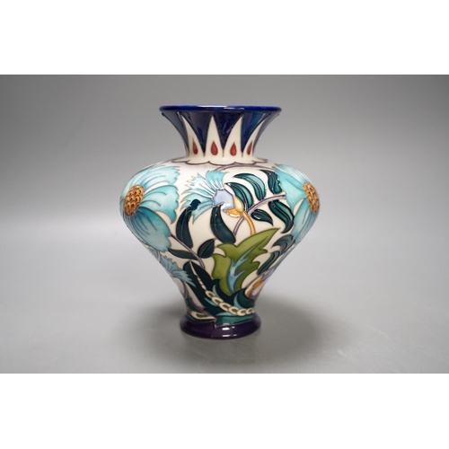 1438 - A Moorcroft 'Persian bouquet' trial vase by Emma Bossons, 3.2.21, boxed,15.5 cms high.... 