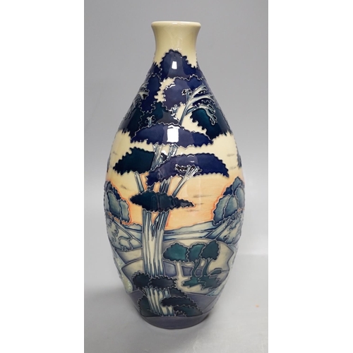 1444 - A Moorcroft 'trees in a landscape' trial vase, boxed,23cms high.