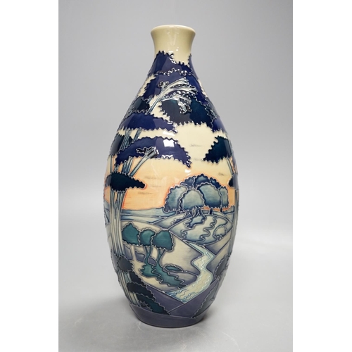 1444 - A Moorcroft 'trees in a landscape' trial vase, boxed,23cms high.