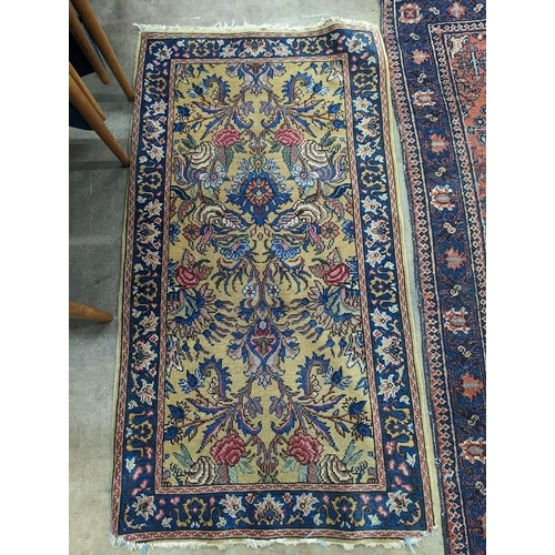 1075 - A North West Persian rug, 140 x 76cm